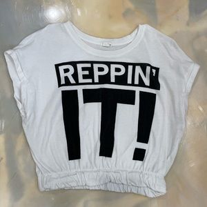 Garage crop-top with "REPPIN IT"